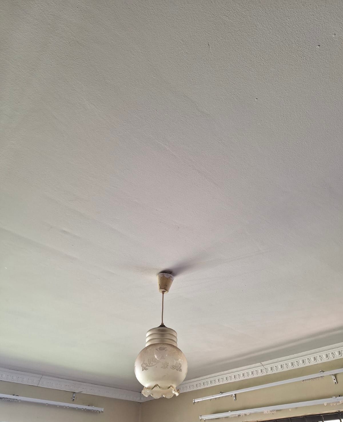 Interior ceiling after mould treatment — bright clean white surface